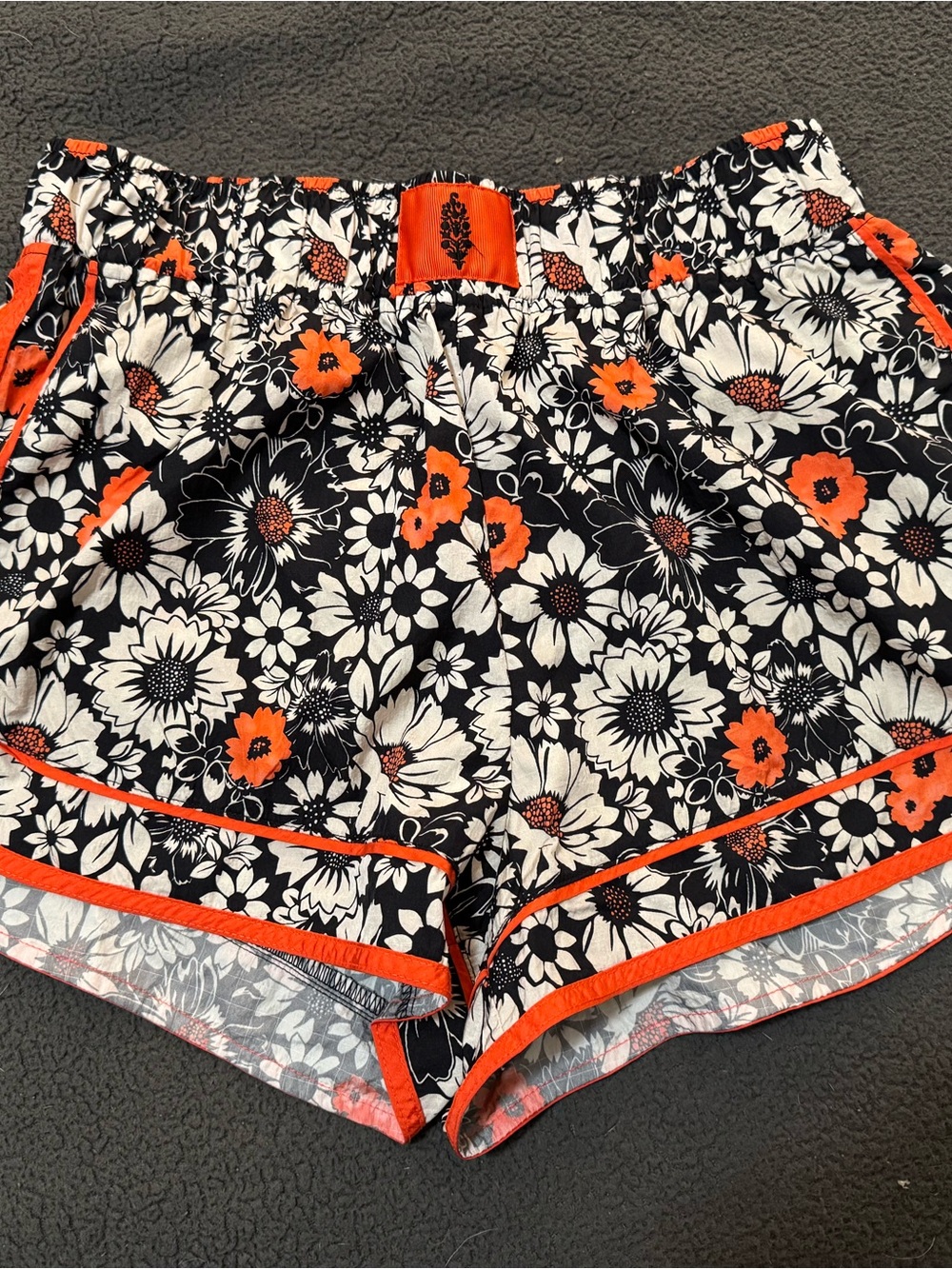 FP Movement by Free People Black, White & Orange Floral Athletic Shorts